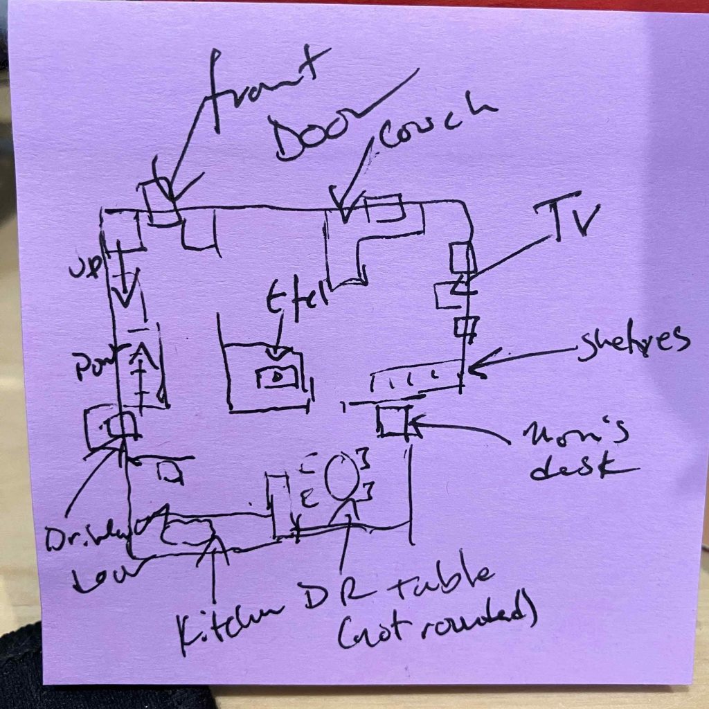 A purple sticky note with a sketch of the blueprint of a living room.